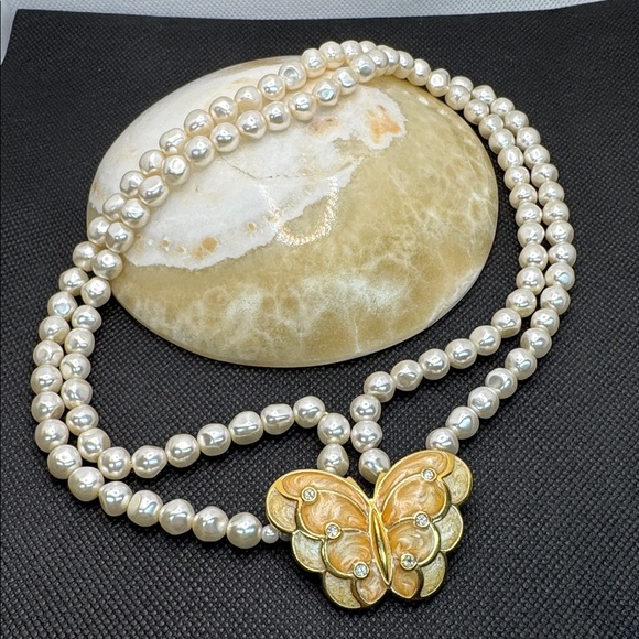 Avon Jewelry - Vintage KJL for Avon faux pearl necklace with enamel crystal butterfly pendant.